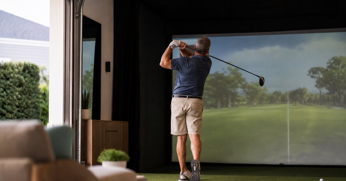 How much space does a premium home golf simulator bay actually require?